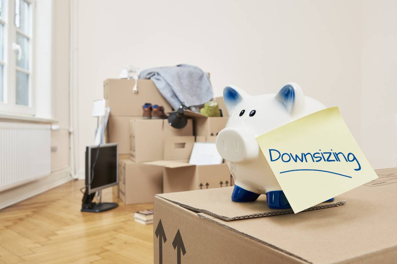 Decluttering regularly helps you downsize and save money before your house movers arrive.